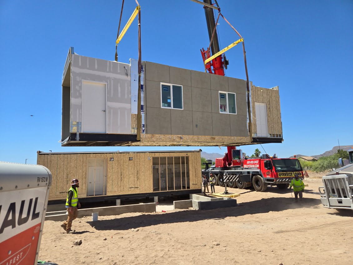 Polaris Modular crane setting a steel-framed module onto its foundation