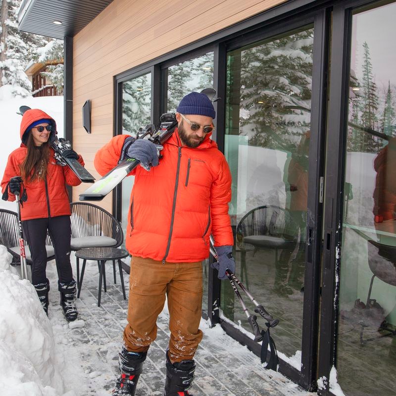 Skiers outside the 326 Ridgeview home in winter